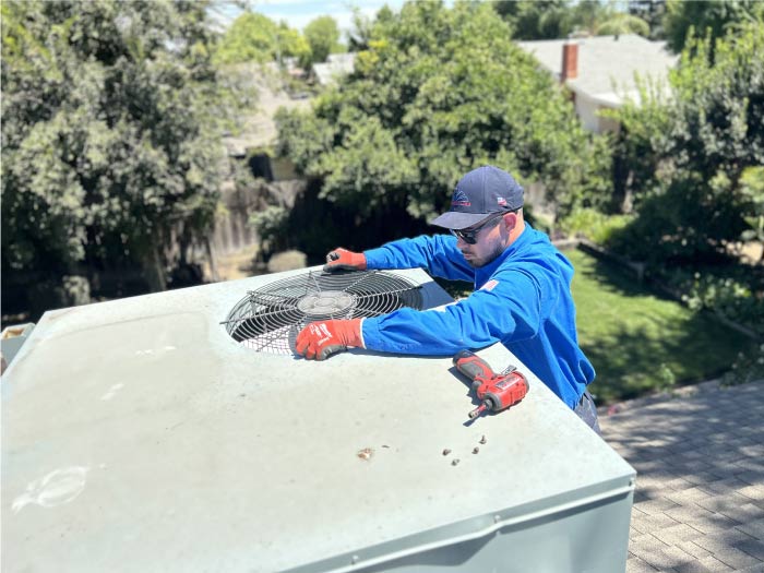 Mechanical Air professionals at a client's home, ensuring a smooth and efficient AC service and repair process.