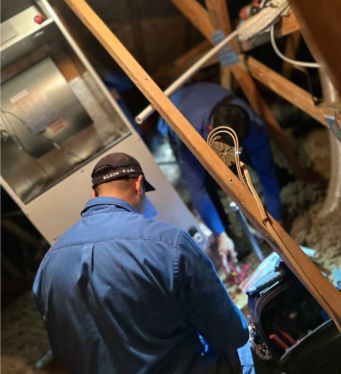 ventilation-services Professional HVAC technicians to perform a residential heating system inspection for optimal performance and safety.