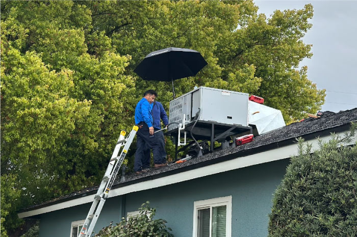 Owner nou vang and technician conducting a full new AC unit installation for a satisfied homeowner.