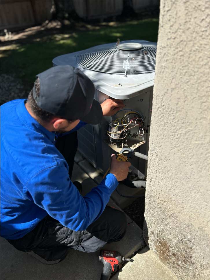 residential AC tune-up in progress, ensuring comfort during a hot Central Valley summer