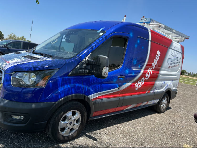 A Mechanical Air LLC service van featuring a vibrant red, white, and blue professional wrap with the company phone number 559-577-3668 and website mech-air.com clearly displayed.
